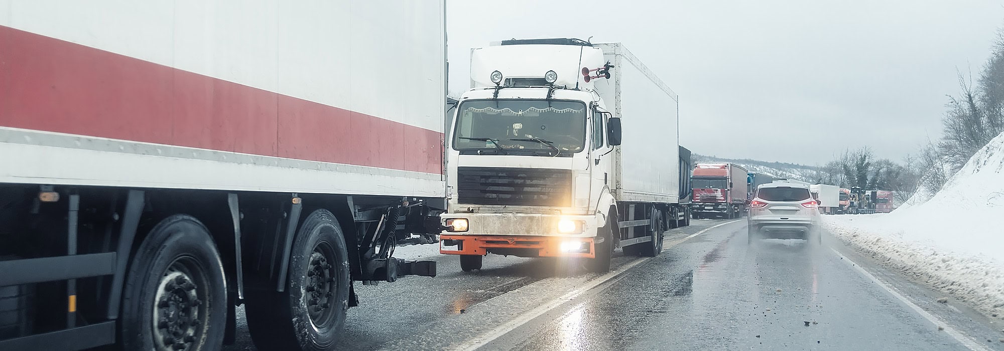 Trucks on snowy highway