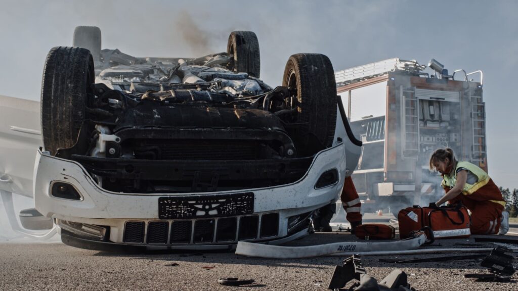 Flipped car Car flipped upside down on a road