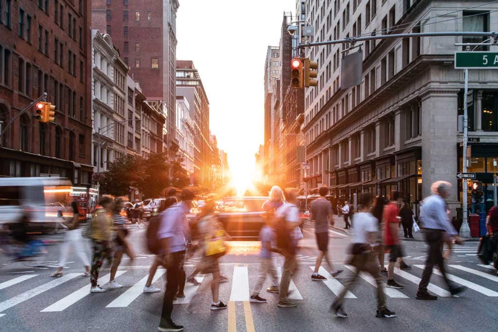 City Street Pedestrian Crossing at Sunset Blurred pedestrians crossing at sunset